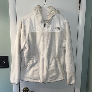 White fuzzy north face jacket
